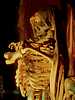 Skeletal Statue and Rising Apparitions